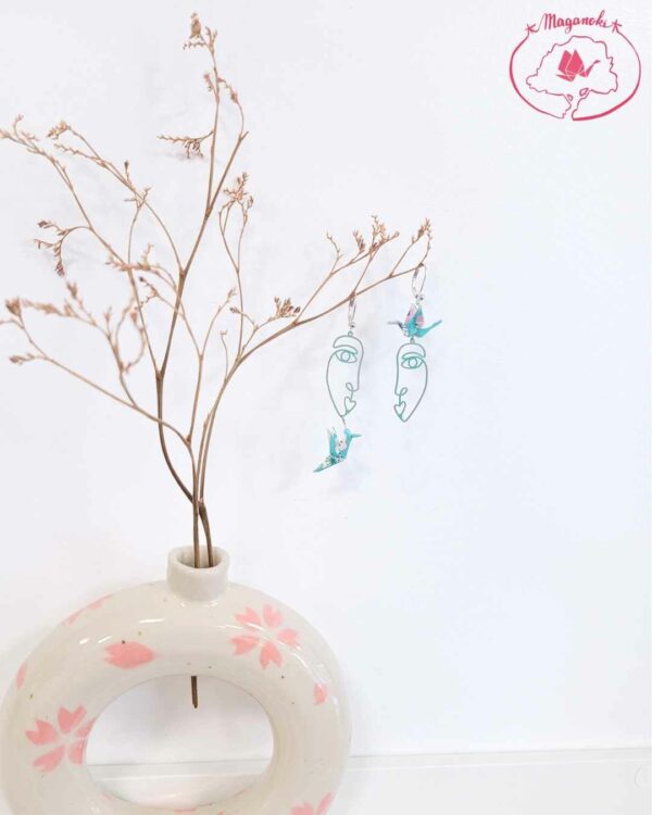 boucles d'oreilles en origami japonaises colombes et grues pastelles sur visages
