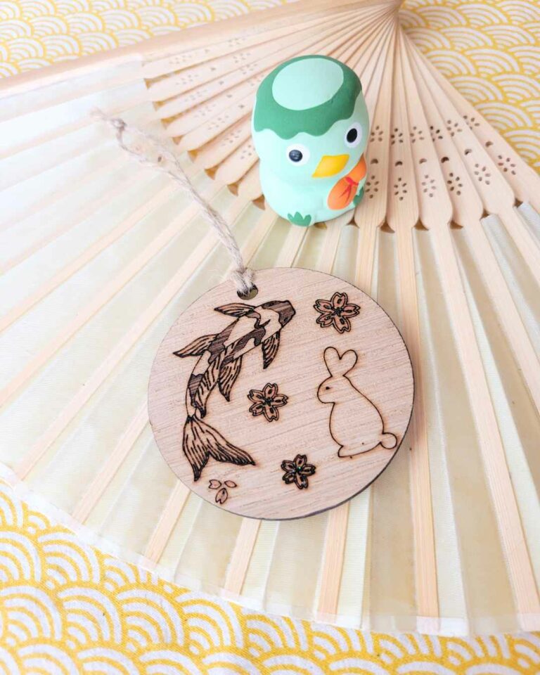 suspension bois carpe et lapin 1
